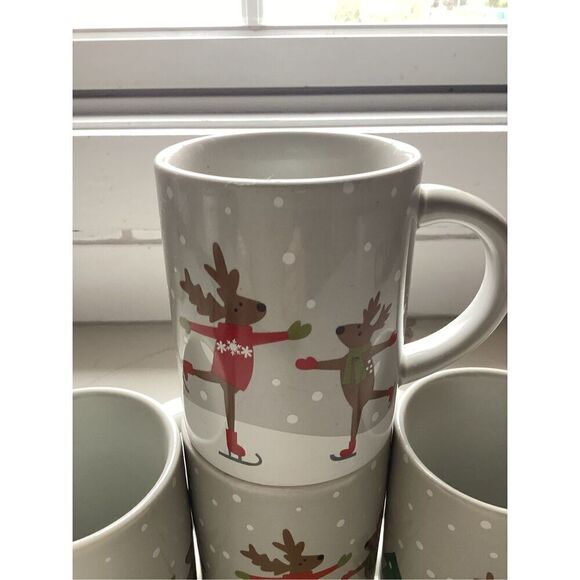 Set of 4 Crate & Barrel 12oz Ceramic Coffee Mugs Joan Anderson Skating Reindeer - Picture 2 of 7